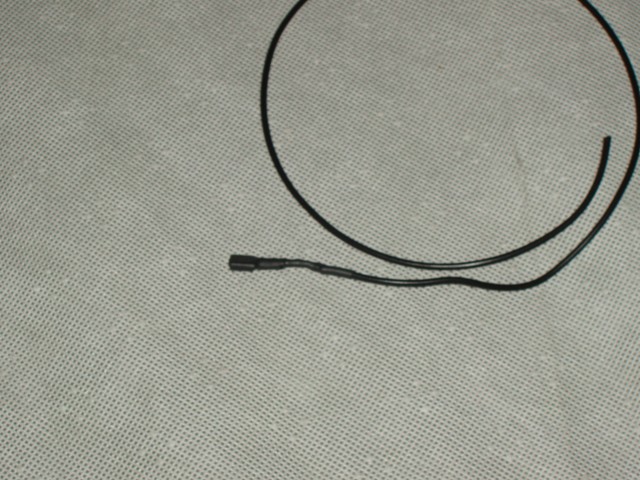 Shrink wrapped black wire